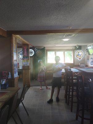 Kids playing darts