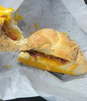 Bacon egg and cheese on a roll over easy with just salt and pepper.... absolutely delicious and reasonably priced