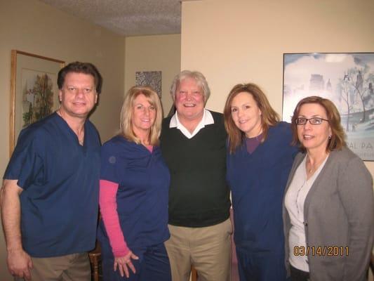 Dr Jeff Lapsker, with his staff, and one of their favorite patients, Bobby Hull