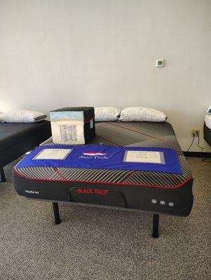 Cool-to-touch black ice blend fabric cover. HD memory foam removes body pressure and promotes heat transfer. 3-Zones with pocketed coils.