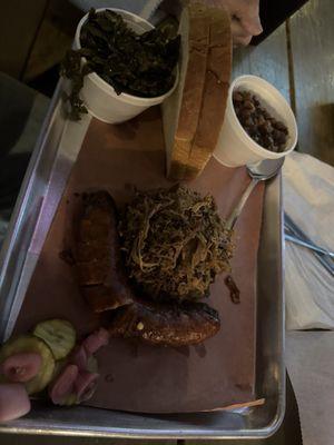 Mixed bbq platter: pulled pork, smoked sausage, collard greens, baked beans