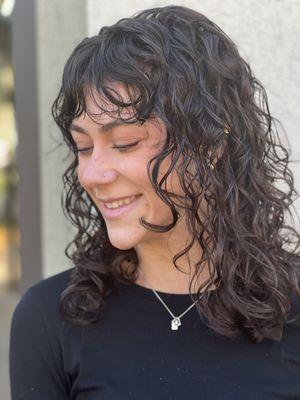 She was so happy with the results of a deva curl cut/style