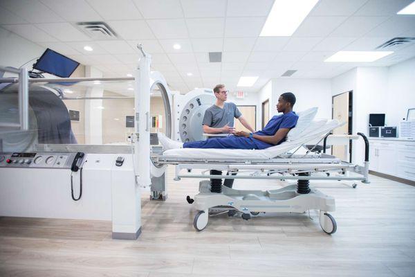 Large, comfortable hyperbaric oxygen chambers, each with an entertainment system.