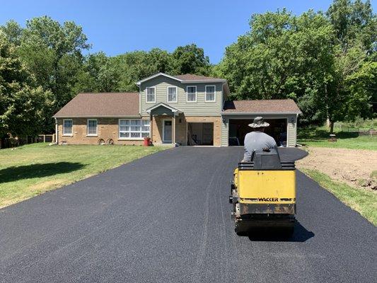 Beautiful Asphalt Driveway. A Great Way To Enhance the Exterior of your Home & Increase Property Value!