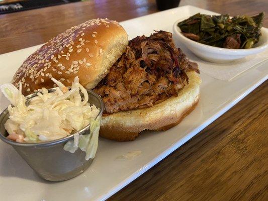 Pulled Pork BBQ Sandwich and greens, pork belly sammie with beer au jus.