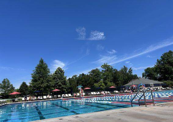 The diving area is located in the deep end of the large 50-meter pool.