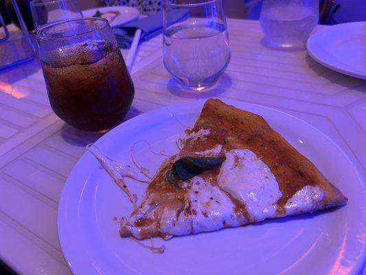 Pizza slice and drink