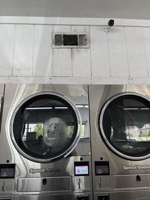 Dirty vent/walls and crusty counter area.