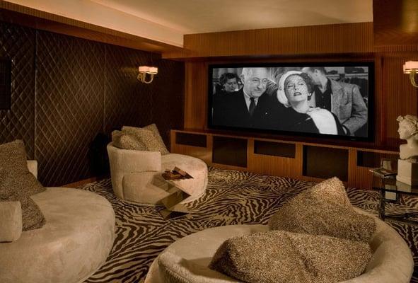 Blu Note Home Theater designs full theater room solutions. Projection TV's, surround sound, components, Stuart Film Screens