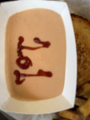 Sauce with 101 written in ketchup