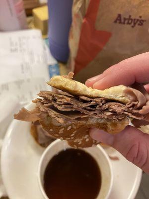 1/2 pound roast beef sandwich with hardly any meat. This was cut in half with a bite taken out. Less meat than the first sandwich.