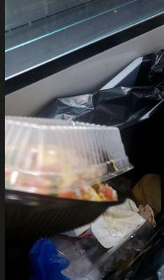 Nachos in store trash bin