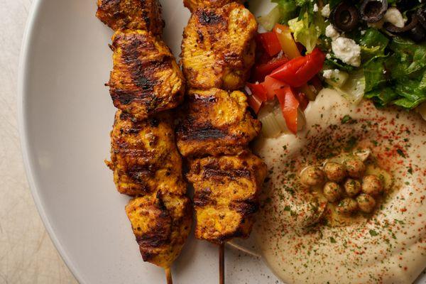 Chicken Kabob, with Hummus and Greek Salad as sides.