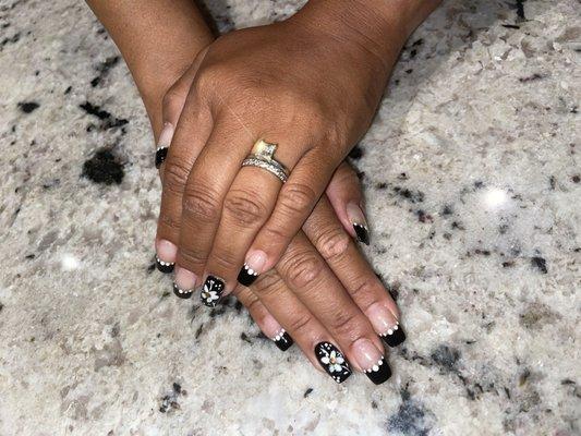 Tina did a phenomenal job. Just tell her your ideas and she will make it happen. I'm still in awe everytime I look at my nails.