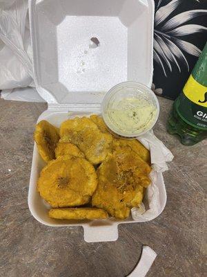 Tostones with Dipping sauce. The white sauce was amazing . Never a disappointment when I come. I love ordering from Papi!