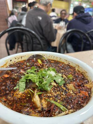 spicy fish with flaming chili broth