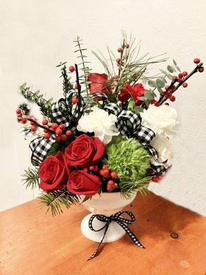 A twist on the traditional Christmas with a black and white check ribbon!