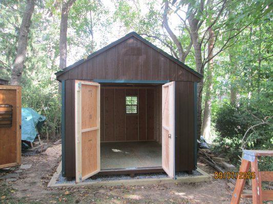 The shed in final location 170' from street (on a gravel pad)