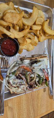 Philly cheesesteak and twister fries