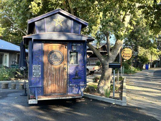 Witches house outside of shop.