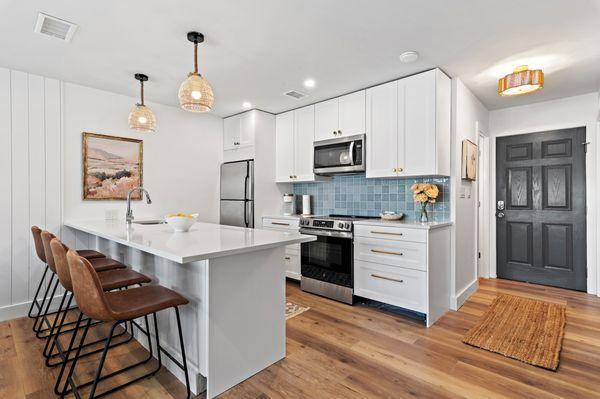Villa kitchen flooring remodel featuring Norwoodhill Laminate Camellia