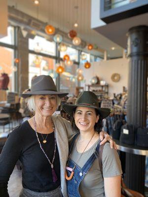 Hat shopping with mama.