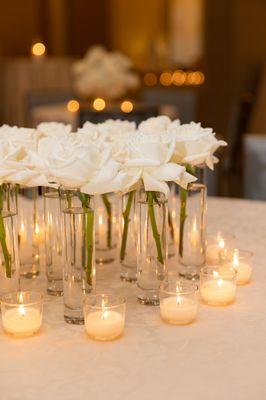 Candle and floral decor for a wedding!
