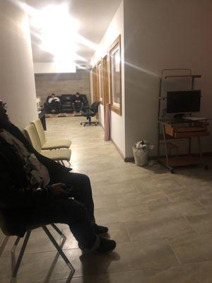 Dark room in waiting room. Literally no light. Just people sitting in the dark.
