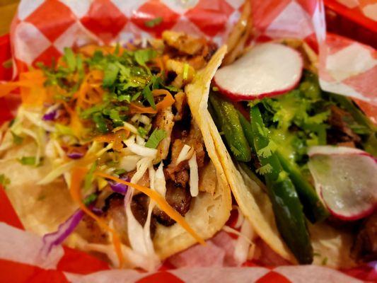 Pork belly taco and carne asada taco