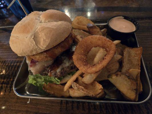 Western burger with "house fries" and an extra onion ring my daughter gave me.