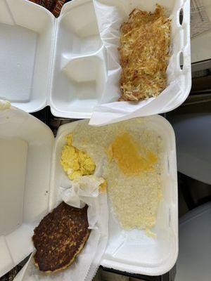 Salmon pattie grits and eggs with a side of hashbrowns