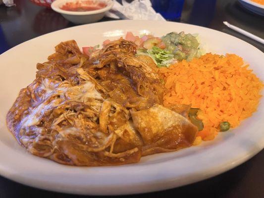 Chilaquiles with guacamole salad and rice