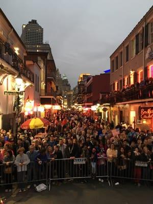 Making the turn onto Bourbon from Bienville...a healthy, bead-loving crowd