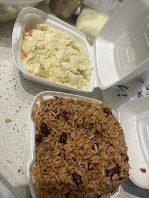 Coleslaw and rice and peas