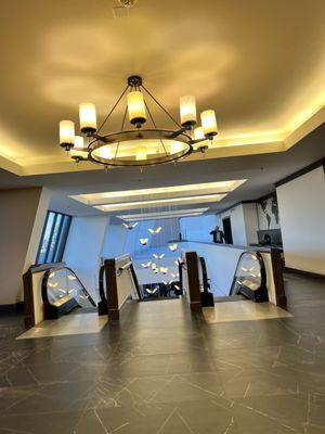 To lower level conference rooms