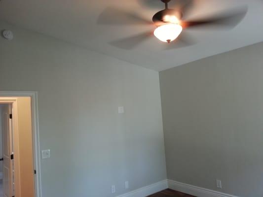 Ceiling fan and light, controlled by dual dimmer. Decora white tamper proof receptacle devices.