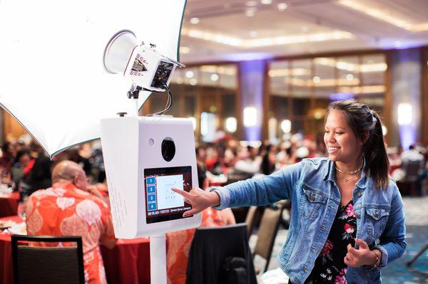 Our friendly photo booth attendant in action!