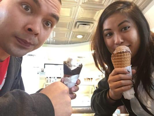 Rock road ice cream on a waffle cone. Cookie dough on a chocolate covered waffle cone.