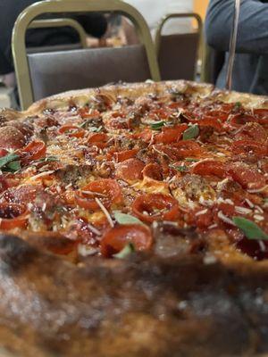 UNCLE KEVIN// red sauce, mozzarella mix, pepperoni, italian sausage, red wine reduction, parmesan, oregano
