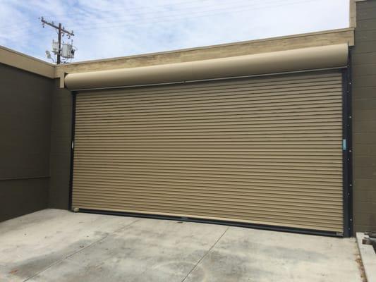 A Lawrence rolling steel door with motor.