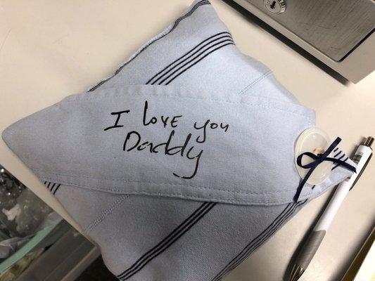 Pillow made out of dad's old shirt with his button in tow, and his writing embroidered on top!!!