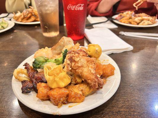 Fried squid. Chicken wings. Broccoli and chicken. General Gau. Crab rangoons. Fried shrimp. Amazing crab legs.