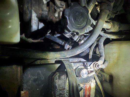 Plug wire that was not put back properly completely out of the tube causing misfire.