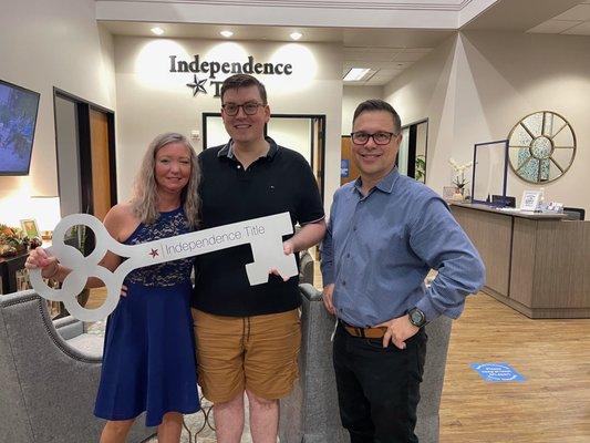 Our thrilled faces after closing on our dream home!!