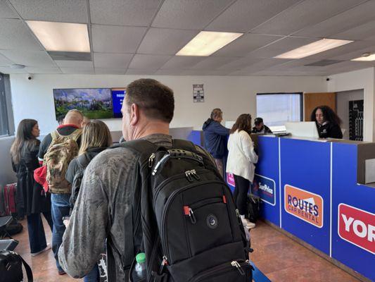 LONG lines few reps to help AND few cars to rent