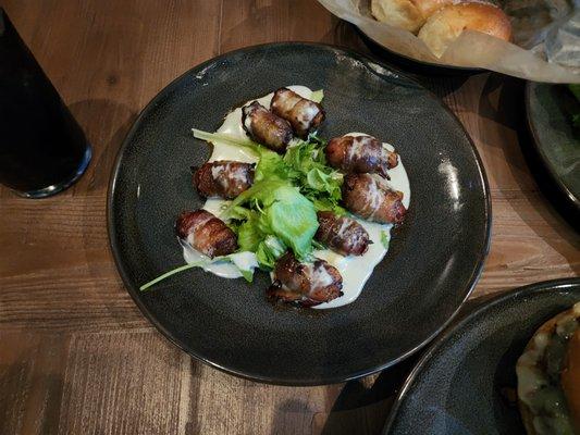 ONE PUTT: dates wrapped in bacon, stuffed with chorizo, manchego cheese; finished with blue cheese sauce