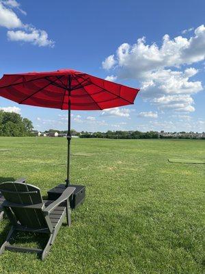 Chairs to sit at behind driving tees