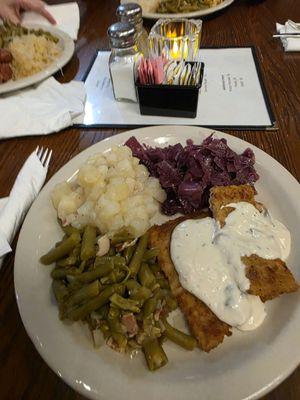 Buffet: pork and chicken schnitzel, green beans, German potato salad, and spiced cabbage ... delicious!