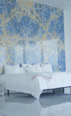 Stunning blue marble headboard wall.