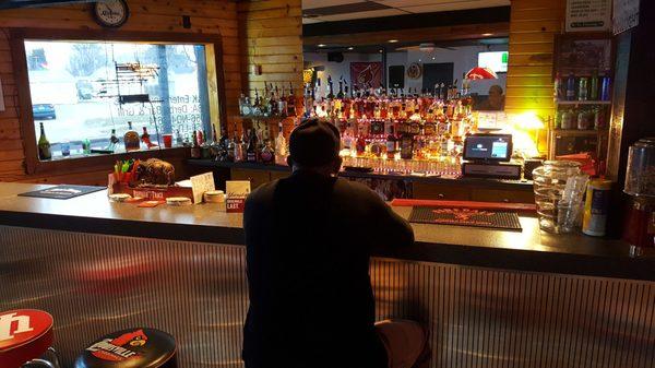 Full bar, 4 beers on tap and 3 shelves of liquor + wells.